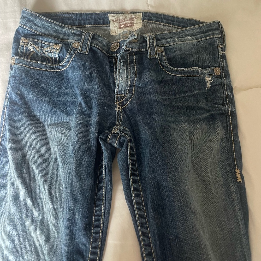 Medium wash bug star denim jeans